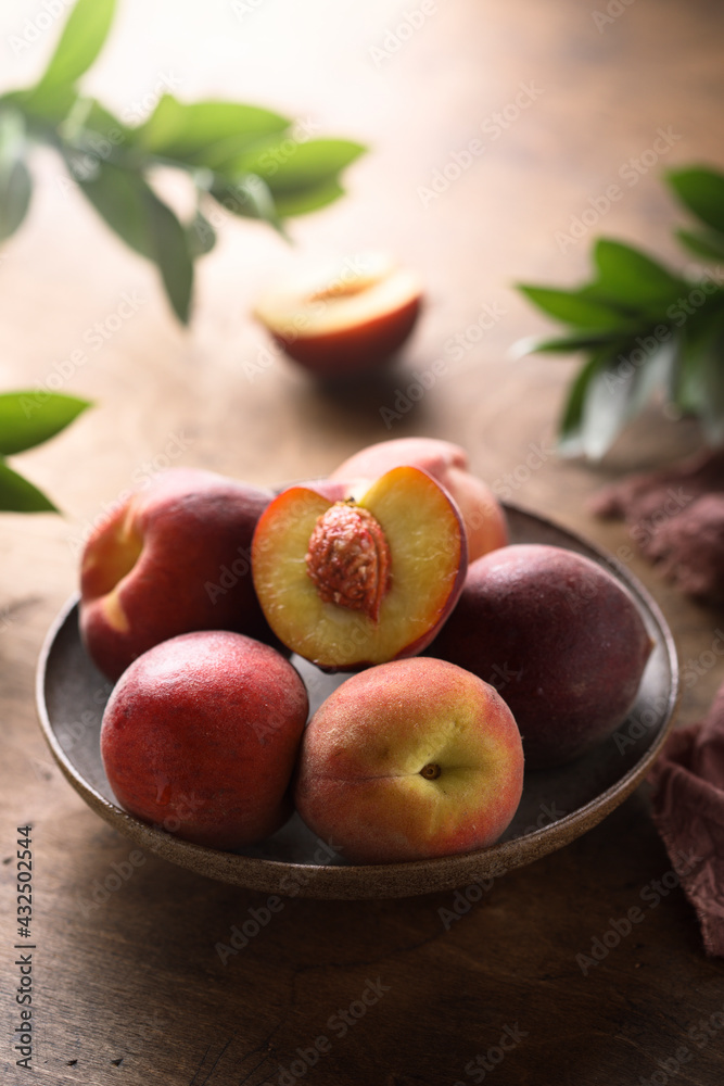 Fresh ripe peaches in a bowl Fresh ripe peaches in a bowl
