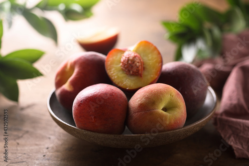 Fresh ripe peaches in a bowl