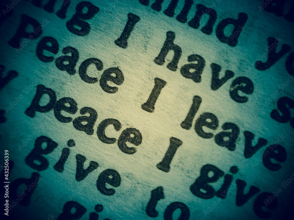 Obraz premium Wish of peace. Macro shot of a Bible verse from the Gospel of John chapter 14 verse 27.