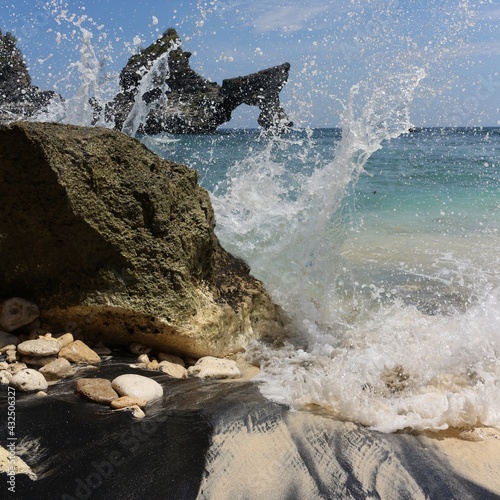 waves crashing on rocks