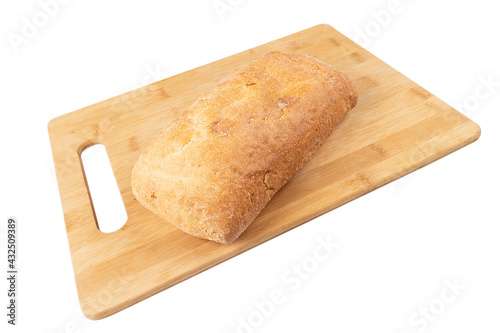 Fresh testy wheat bread isolated on white background. Bakery concept