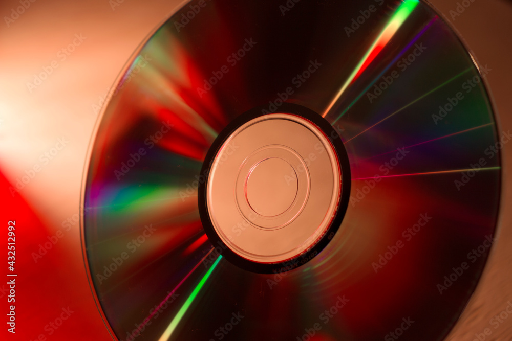 compact disc on a wooden table