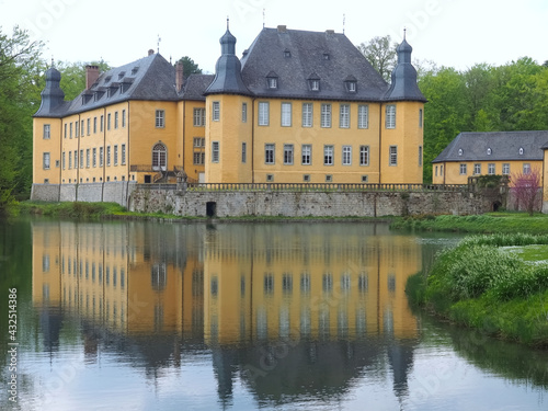 German water castle Schloss Dycki in spring photo