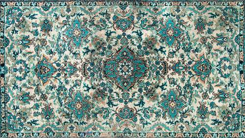 The texture of a Persian carpet, an abstract ornament. Round Mandala Pattern, Traditional Middle Eastern Carpet Fabric Texture. Turquoise milky green beige, light green, brown. vintage,oriental motifs photo
