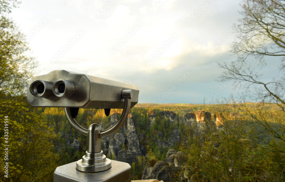 Binocular viewer over a valley in saxon switzerland, Germany