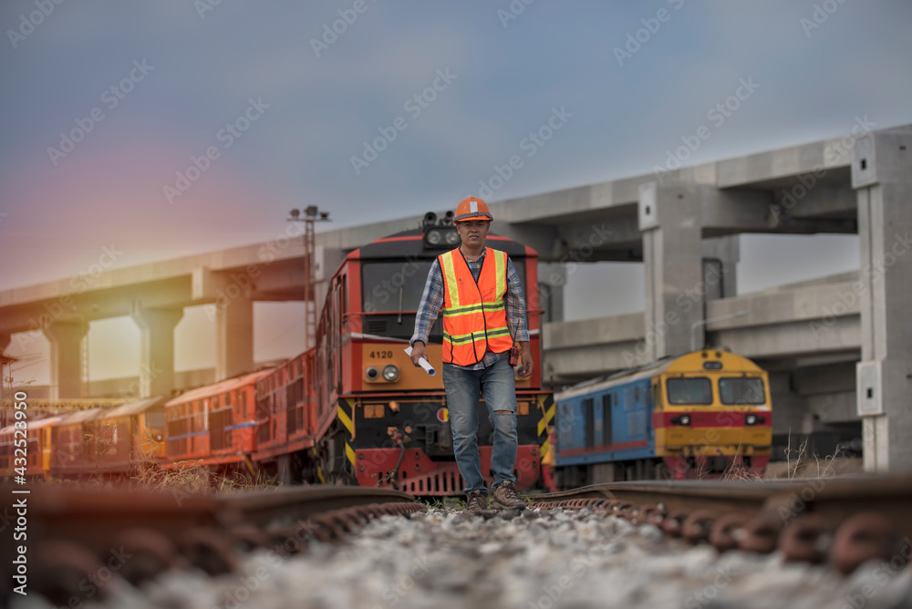 Engineer on railways. engineer train on the railway. Worker walk on railway. engineer railway concept. infrastructure, rails, engineer.
