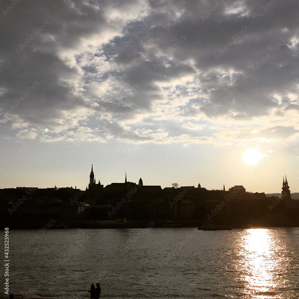 Naklejka premium sunset over the river