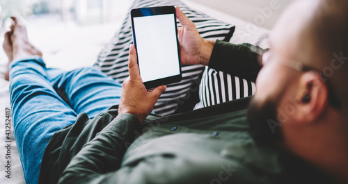 Photography Man surfing modern tablet during rest
