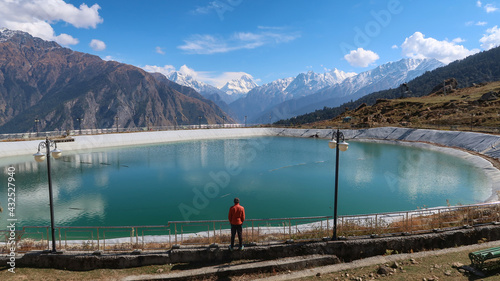Beautiful Auli lake with snow cap Himalayas mountains in the backdrops Joshi math Uttarakhand  photo