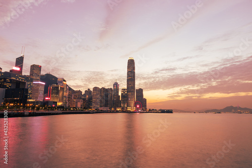 skyline panorama of  Colourful magnificent sunset city view of Central and admiralty  Victoria Harbour  Hong Kong  photo from Wan Chai promenade