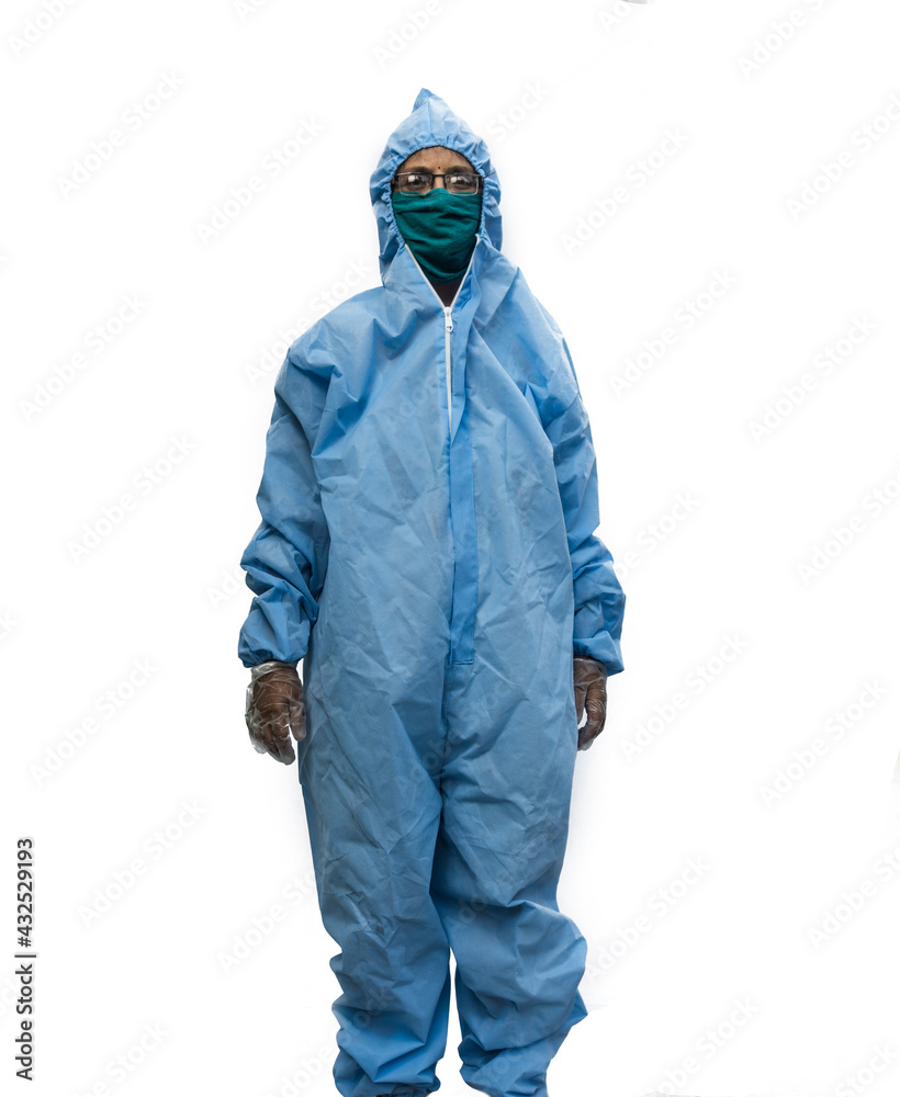 Doctor in PPE kit blue protective suit, surgical mask latex gloves. doctor holding syringe in white background