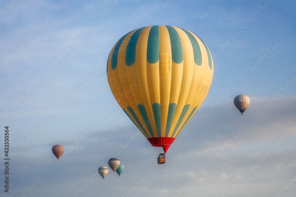 Fototapeta premium Turkey, Cappadocia, hot air balloons over the Cappadocia mountains, a popular destination for tourists. the photos were taken on May 21, 2018 in Cappadocia, Turkey