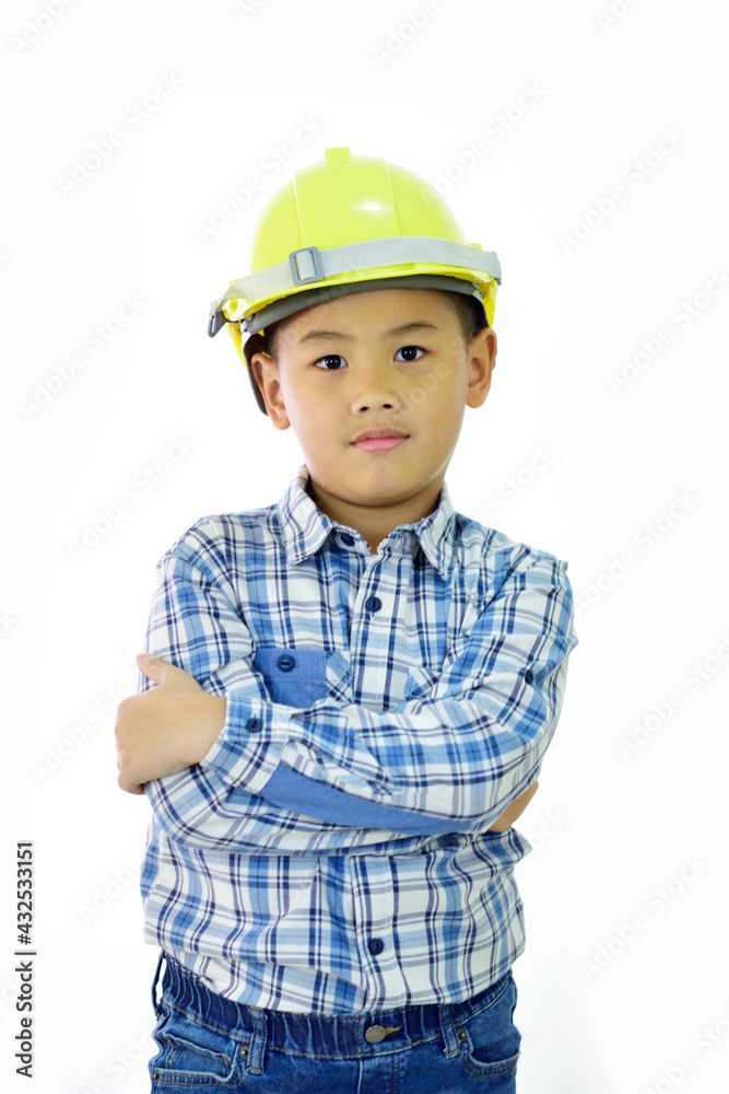 Cute Asian boy 7 years old with engineer uniform, white background