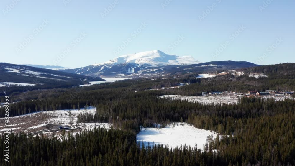 Sweden wilderness Åre mountain landscape ski skiing sport activity resort on a bright sunny day winter or spring. Aerial drone shot over naturald fields and environment Sweden wilderness Åre mountain landscape ski skiing sport activity resort on a bright sunny day winter or spring. Aerial drone shot over naturald fields and environment