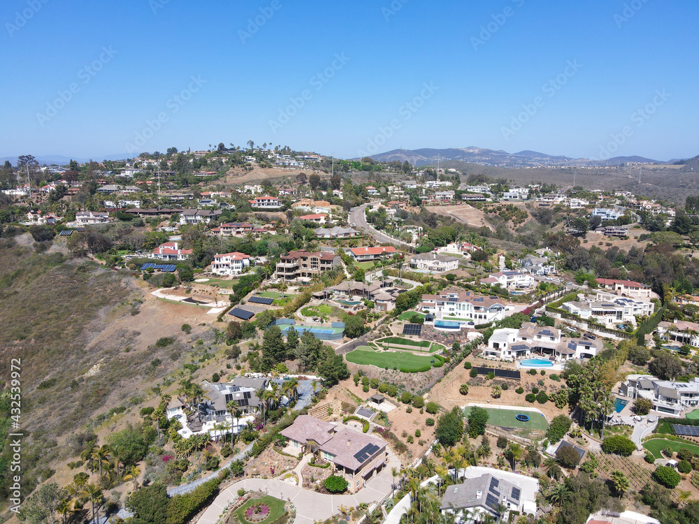 Aerial view off massive expensive mansions in the valley of Carlsbad, North County San Diego, California, USA.