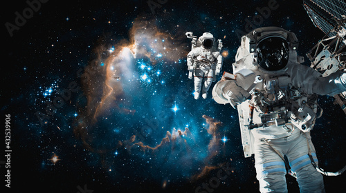 Fototapeta Naklejka Na Ścianę i Meble -  Astronaut spaceman do spacewalk while working for space station in outer space . Astronaut wear full spacesuit for space operation . Elements of this image furnished by NASA space astronaut photos.
