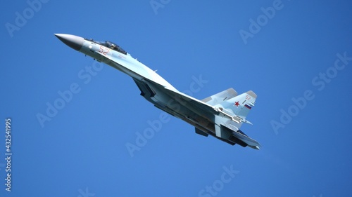 Moscow Russia Zhukovsky Airfield 31 August 2019: aerobatic Su-35 perfoming demonstration flight of the international aerospace salon MAKS-2019 photo