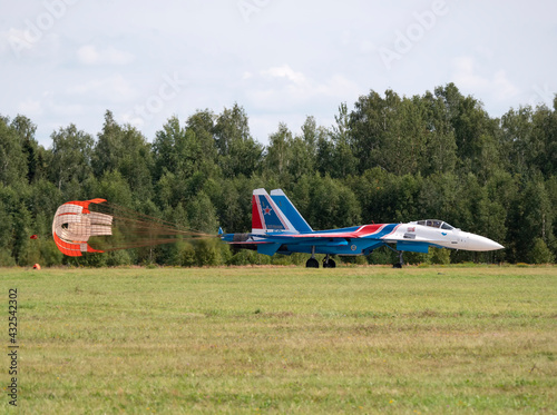 Moscow Russia Zhukovsky Russian Knights Russkie Vityazi aerobatic team performs a demonstration flight aerobatics figures of the international aerospace salon MAKS-2019