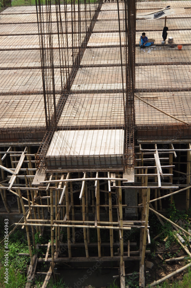 the process of building a building or a residence in the middle of rice fields: Pasuruan, Indonesia -25 Dec 2020