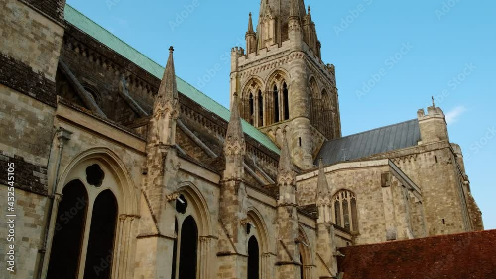Establishing shot of Chichester Cathedral, in West Sussex, England, founded in 1075 featuring both Norman and Gothic architecture Establishing shot of Chichester Cathedral, in West Sussex, England, founded in 1075 featuring both Norman and Gothic architecture