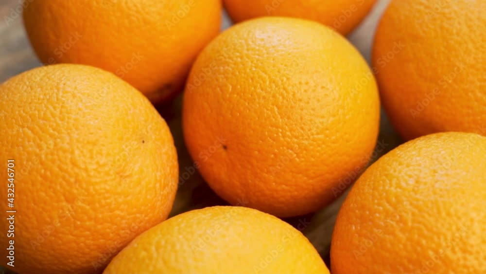 Fresh Oranges, Isolated. Oranges, Citrus Fruits, Healthy Whole Oranges, Unpeeled. Oranges Spin on a Wooden Surface. Fresh Oranges, Isolated. Oranges, Citrus Fruits, Healthy Whole Oranges, Unpeeled. Oranges Spin on a Wooden Surface.
