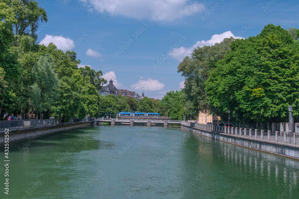 The Isar River whose waters flow from the Alpine region of Tirol in Austria, has long served as a major city attraction, with fishing, leisure, sunbathing, river rafting. Munich, 2014.