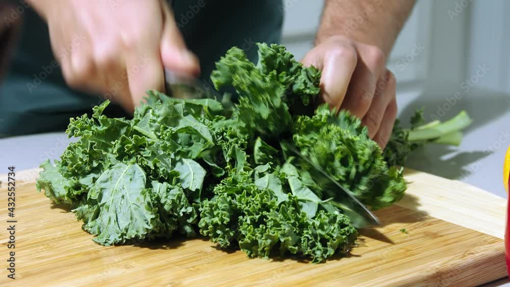 chef cuts the salad slow motion, chief make salad, slice the salad close-up chef cuts the salad slow motion, chief make salad, slice the salad close-up