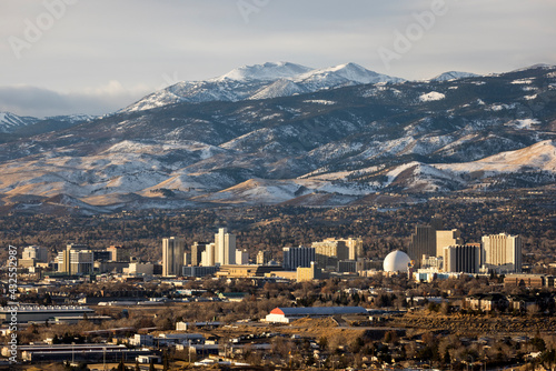 Reno Nevada at sunrise in the winter with snow on the mountains