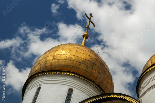 Golden dome of the Assumption Cathedral. This Russian Orthodox church dedicated to the Dormition of the Theotokos was originally the personal chapel for the Muscovite tsars. photo