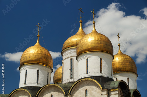 Golden domes of Assumption Cathedral. This Russian Orthodox church dedicated to the Dormition of the Theotokos is located on the north side of Cathedral Square of the Moscow Kremlin.