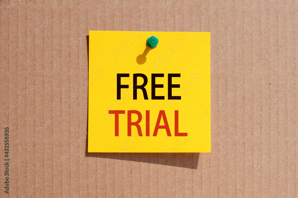 Word writing text Free Trial. Business concept for the ability to buy and sell on your own terms, brown background. Word writing text Free Trial. Business concept for the ability to buy and sell on your own terms, brown background.