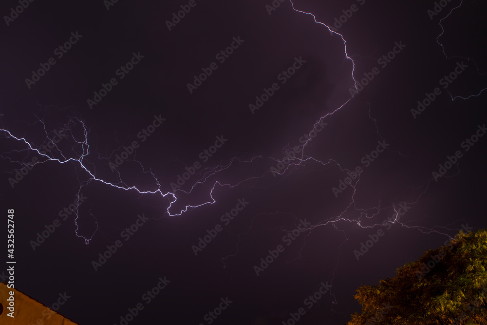 Stormy night sky and thunderbolts