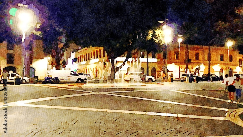The nocturnal glimpse of the square of a town in Sardinia in Italy.