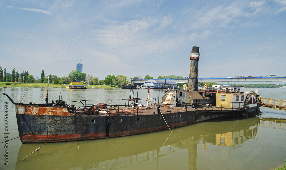 The old abandoned steamboat on the river in Belgrade The old abandoned steamboat on the river in Belgrade