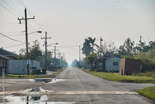 Long straight town road in rural florida