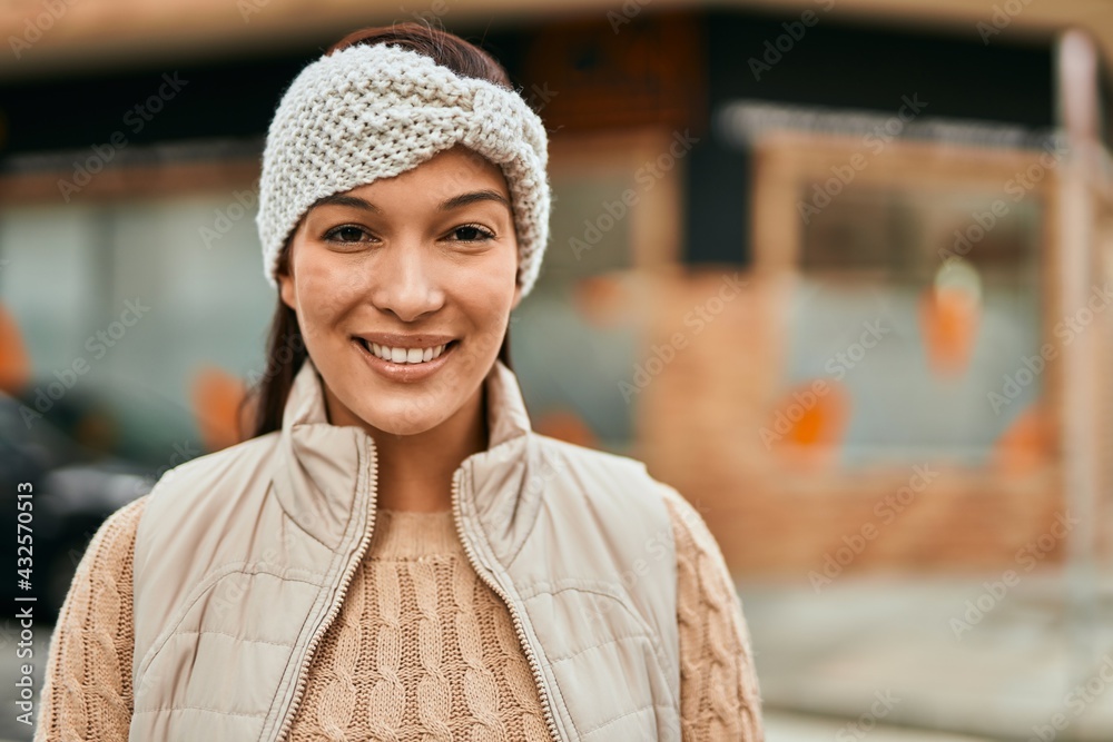 Young latin woman smiling happy standing at the city. Young latin woman smiling happy standing at the city.