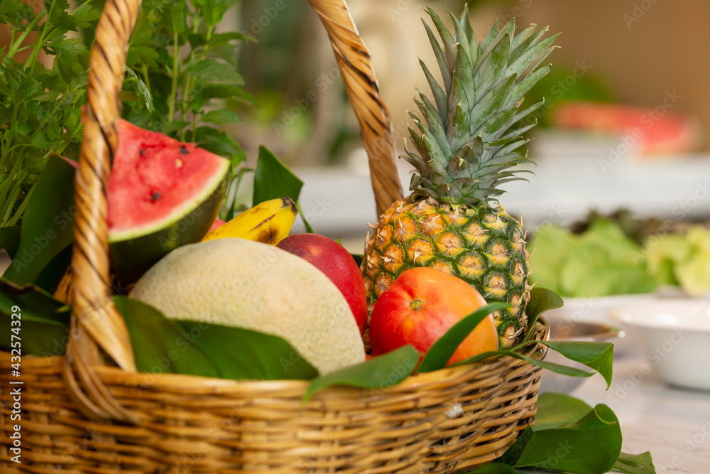 fresh fruit in a basket, pineapple  and watermelon 