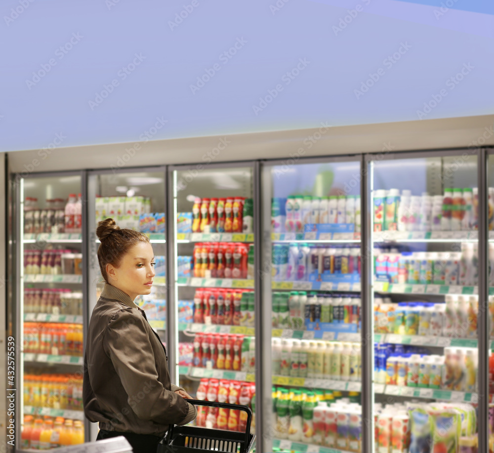 Woman choosing a dairy products at supermarket