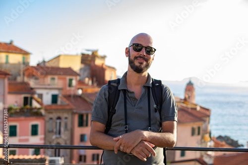 happy tourist man take selfie in Tellaro village, Lerici. Holidays in Liguria region, Italia 