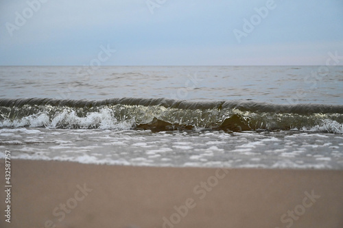 Fototapeta Naklejka Na Ścianę i Meble -  Close-up of water wave splashes by the sea