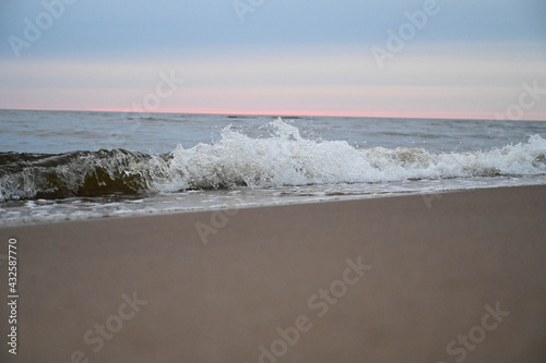 Fototapeta Naklejka Na Ścianę i Meble -  Close-up of water wave splashes by the sea