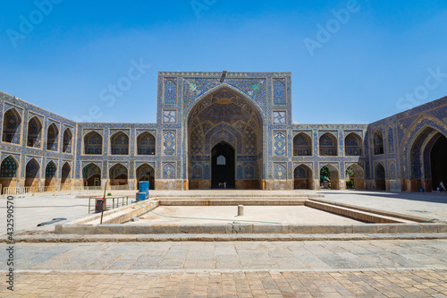 Isfahan, Iran - May 2018: Imam Mosque architecture at Naghsh-e Jahan Square in Isfahan, Iran.
