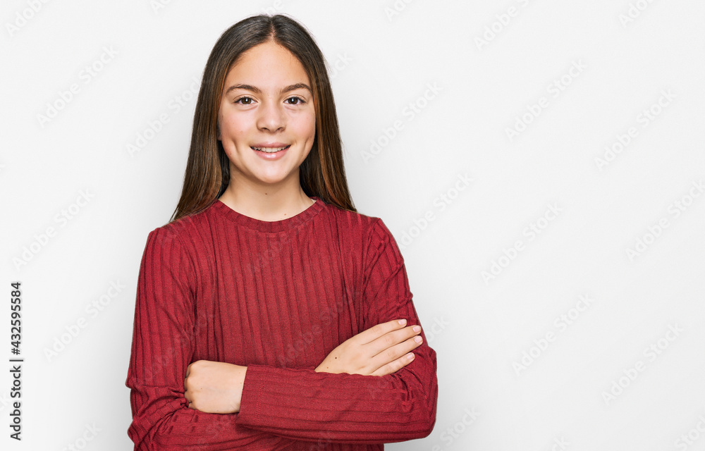 Beautiful brunette little girl wearing casual sweater happy face smiling with crossed arms looking at the camera. positive person.