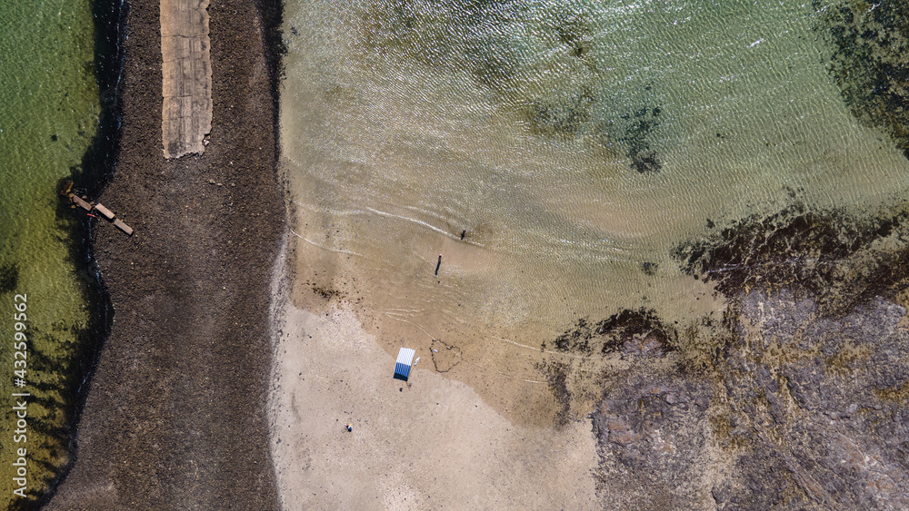 Aerial shot of the beach with love heart