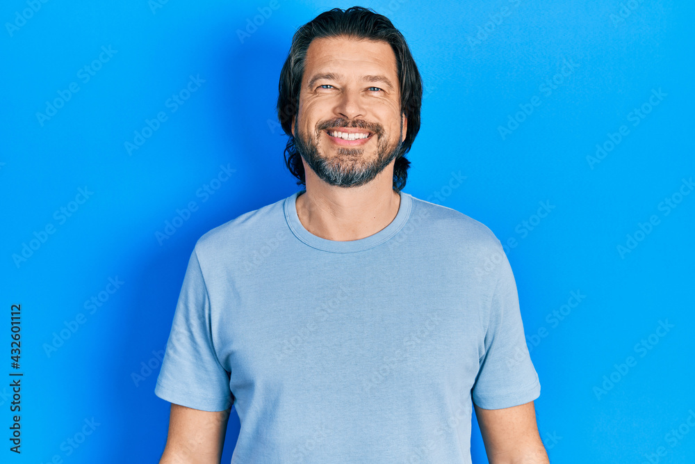 Middle age caucasian man wearing casual clothes with a happy and cool smile on face. lucky person. Middle age caucasian man wearing casual clothes with a happy and cool smile on face. lucky person.