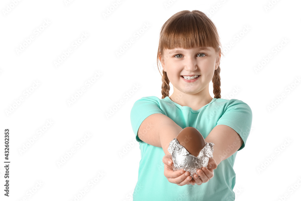 Cute little girl with chocolate Easter egg on white background Cute little girl with chocolate Easter egg on white background