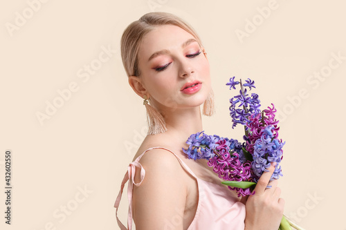 Beautiful young woman with ...