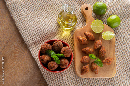 Kibbeh - Minced meat from the Middle East. Fried snack a typical Brazilian popular party dish (kibe). Top view photo