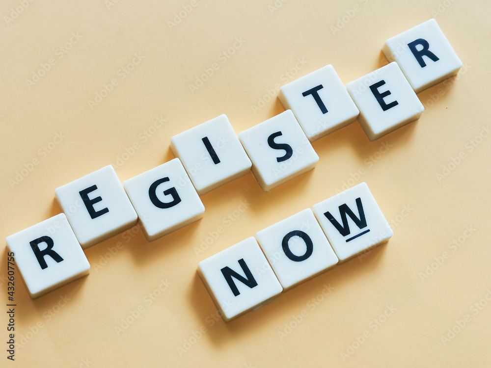 Obraz premium Text register now made from square letter tiles with black font on orange background.