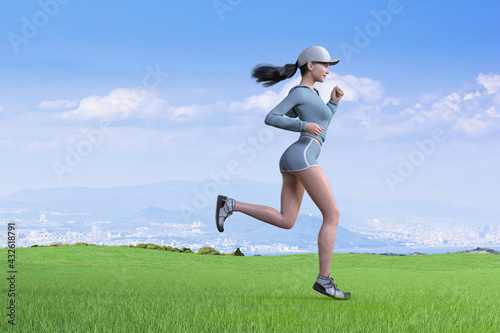 芝生の上をトレーニングで走るマラソンランナーの女性